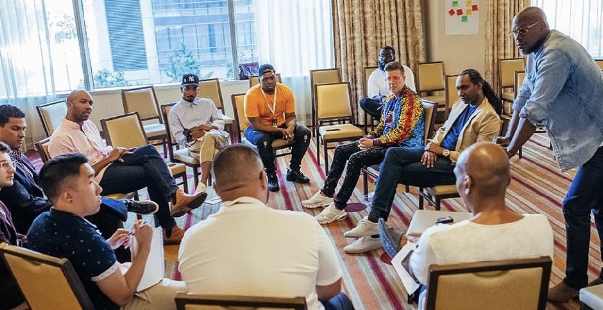 Men in circle dialogue