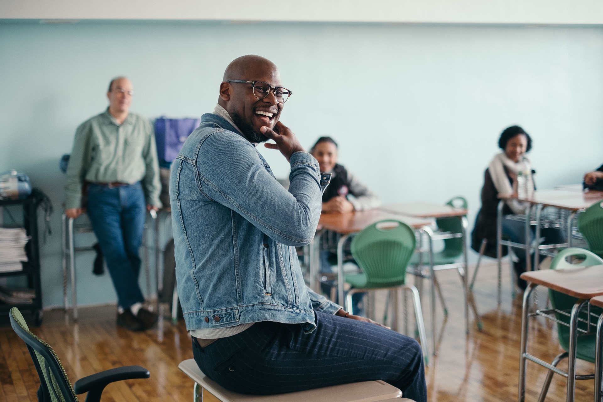 Facilitator laughing with participants