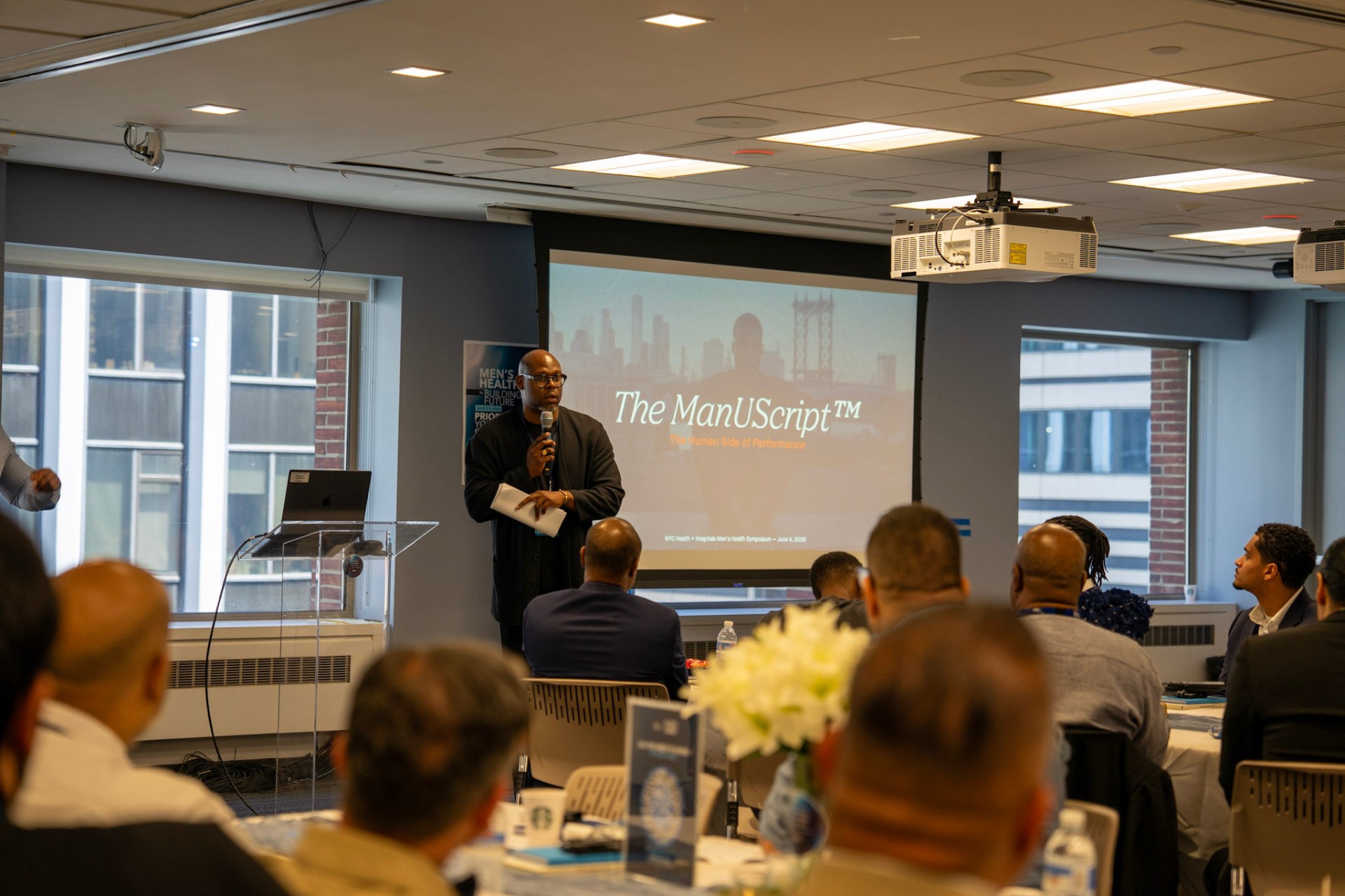 Jason Rosario presenting The ManUScript at the NYC Health + Hospitals Men's Health Symposium